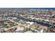 Bird's eye view showcasing home's waterfront location and neighborhood context at 920 Via Tripoli, Punta Gorda, FL 33950