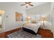 Bright bedroom with wood floors and a comfortable bed at 920 Via Tripoli, Punta Gorda, FL 33950