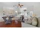 Open living space with hardwood floors and dining area at 920 Via Tripoli, Punta Gorda, FL 33950