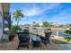 Relaxing patio overlooking a canal, perfect for outdoor entertaining at 920 Via Tripoli, Punta Gorda, FL 33950