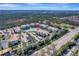 Bird's-eye view highlighting condo's position within a tranquil lakefront community at 1000 San Lino Cir # 1011, Venice, FL 34292