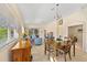 Bright dining area with lots of windows and tiled flooring at 1117 Topelis Dr, Englewood, FL 34223