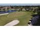 Golfers on a putting green at 1207 Highland Greens Dr, Venice, FL 34285