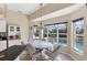 Eat-in kitchen with bay window and view of the pool area at 1207 Highland Greens Dr, Venice, FL 34285