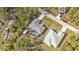 Birds-eye view of home with yard, neighboring houses and the street at 1230 Gantry Rd, North Port, FL 34288