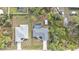 An aerial view displays a home with a pool, shed, and backyard at 1230 Gantry Rd, North Port, FL 34288