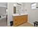 Bathroom featuring single vanity with neutral counter, cabinet, and tile flooring at 1230 Gantry Rd, North Port, FL 34288