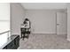 Bedroom featuring neutral paint and carpet with one window and closet at 1230 Gantry Rd, North Port, FL 34288