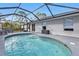 Screened pool and patio area offers an amazing outdoor living space at 1230 Gantry Rd, North Port, FL 34288