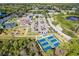 Aerial view of community amenities including tennis and pickleball courts at 13298 Scrub Jay Ct, Port Charlotte, FL 33953