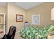 Bedroom with full-size bed and home office space at 13298 Scrub Jay Ct, Port Charlotte, FL 33953