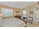 Spacious main bedroom with king bed and access to the pool at 13298 Scrub Jay Ct, Port Charlotte, FL 33953