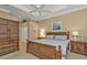 Main bedroom with king-size bed and large wardrobe at 13298 Scrub Jay Ct, Port Charlotte, FL 33953