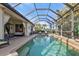 Stunning screened pool and spa, ideal for enjoying Florida sunshine at 13298 Scrub Jay Ct, Port Charlotte, FL 33953