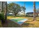 Basketball court in a sunny backyard at 157 Angol St, Punta Gorda, FL 33983