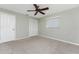 Bright bedroom with ceiling fan and carpet at 157 Angol St, Punta Gorda, FL 33983