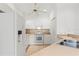 White kitchen with appliances and light countertops at 1577 Red Oak Ln, Port Charlotte, FL 33948