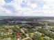 Wide aerial view showcasing a house's location in a residential area at 158 Chickering St, Port Charlotte, FL 33954