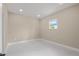 Bright bedroom with tile floors and double closets at 158 Chickering St, Port Charlotte, FL 33954