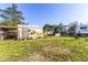 Large backyard with shed and artificial turf at 159 Date St, Punta Gorda, FL 33980