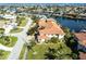 Luxury waterfront home with private dock and lush landscaping at 180 Hibiscus Dr # 112, Punta Gorda, FL 33950