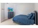 Light and airy bedroom with a comfortable bed and built-in drawers at 180 Hibiscus Dr # 112, Punta Gorda, FL 33950