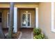 Welcoming entryway with a double door and a charming walkway at 180 Hibiscus Dr # 112, Punta Gorda, FL 33950