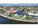 Stunning waterfront home with a private pool and dock, located in a desirable coastal community with a beautiful water view at 183 Maria Ct, Punta Gorda, FL 33950