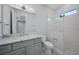 Bathroom showcasing gray vanity with marble countertop and glass-enclosed shower at 183 Maria Ct, Punta Gorda, FL 33950