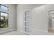 Bright room with large windows and a minimalist design and walk in closet at 183 Maria Ct, Punta Gorda, FL 33950