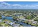 Waterfront houses and canals from an aerial view at 18390 Burkholder Cir, Port Charlotte, FL 33948