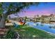 Backyard waterfront view with hammock at 18390 Burkholder Cir, Port Charlotte, FL 33948