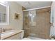 Bathroom with tub and shower combination at 19505 Quesada Ave # Jj101, Port Charlotte, FL 33948