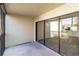 Covered patio with sliding glass doors, offering an outdoor entertainment space at 1999 Kings Hwy # 16B, Punta Gorda, FL 33980