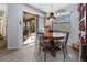 Bright dining area with sliding doors leading to patio at 2202 Gold Oak Ln, Sarasota, FL 34232