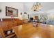 Bright dining room with wood table and access to living room at 2202 Gold Oak Ln, Sarasota, FL 34232