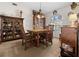 Classic dining room featuring a wood table and hutch at 2202 Gold Oak Ln, Sarasota, FL 34232