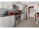 Modern kitchen with stainless steel appliances and granite countertops at 2202 Gold Oak Ln, Sarasota, FL 34232