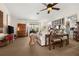 Spacious living room with light beige couches and a wooden coffee table at 2202 Gold Oak Ln, Sarasota, FL 34232