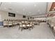 Bright dining room with ample seating and modern light fixtures at 24117 Buckingham Way, Punta Gorda, FL 33980