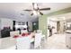 Open dining area with seating for six, overlooking the living room at 2455 Pellam Blvd, Port Charlotte, FL 33948