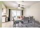 Casual dining area with glass-top table and four chairs at 2455 Pellam Blvd, Port Charlotte, FL 33948