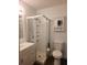 Clean bathroom, featuring shower, toilet, vanity with sink, and storage at 2461 Ivanhoe St, Port Charlotte, FL 33952