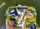 Aerial view of luxurious waterfront home with lush landscaping at 2580 Brazilia Ct, Punta Gorda, FL 33950