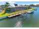 Waterfront home with boat dock, boat lift and lush landscaping at 2580 Brazilia Ct, Punta Gorda, FL 33950