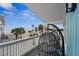 Beachfront balcony with ocean views and comfy hanging chairs at 2726 N Beach Rd, Englewood, FL 34223