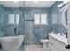 Spa-like bathroom with a freestanding tub and walk-in shower at 2726 N Beach Rd, Englewood, FL 34223