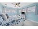 Beach-themed bedroom with a king-size bed and light blue walls at 2726 N Beach Rd, Englewood, FL 34223