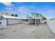 Beach house exterior with two-car garage at 2726 N Beach Rd, Englewood, FL 34223