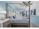 Spacious main bedroom with a large bed and ocean views at 2726 N Beach Rd, Englewood, FL 34223